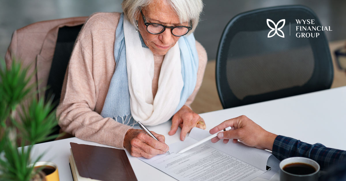 older woman discussing finances with advisor